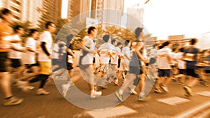 Marathon runners running on the street